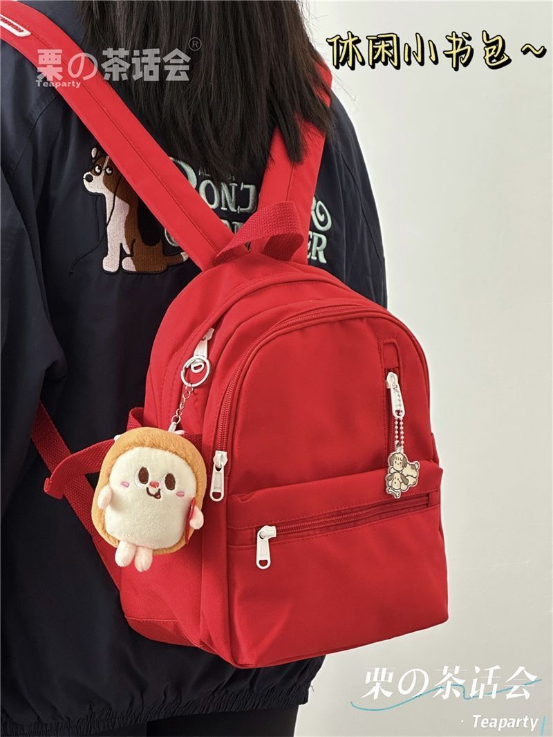 Mochila vermelha, mini mochila de viagem leve, mochila pequena casual para estudantes universitários, feminina
