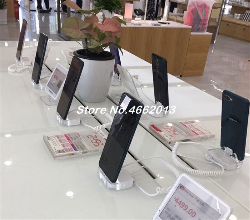 Soporte de seguridad para teléfono móvil iphone sistema antirrobo Burgar soporte de exhibición de alarma acrílico con Control remoto