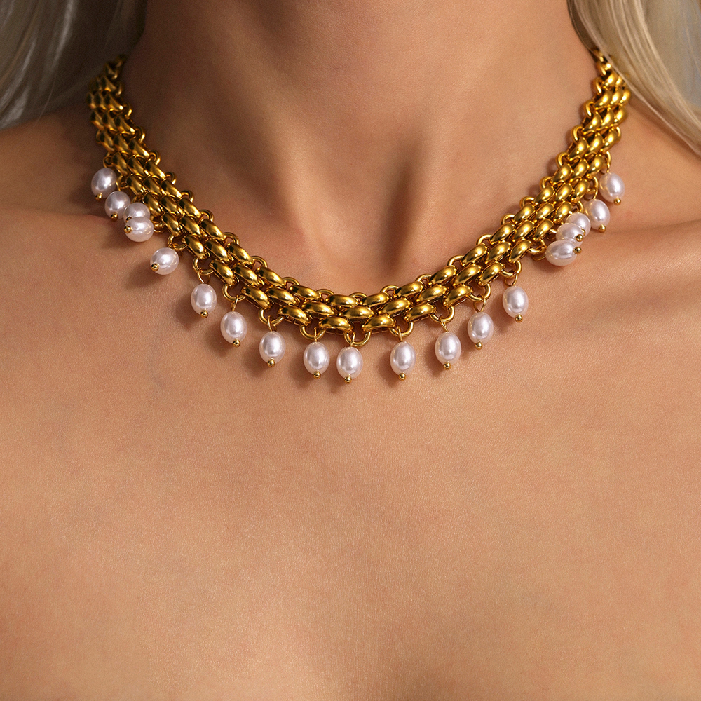 Parure donna collana e bracciale con fiori acciaio - par0021