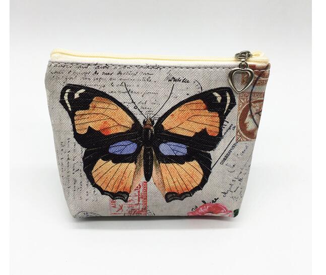 12 st/lot! söt fjäril mynt handväska barn pu läder dragkedja byta handväska kvinnor plånbok: D