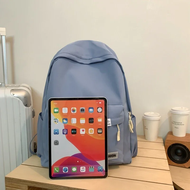 Bolsa de ombro grande capacidade à prova dwaterproof água faculdade viagem mochila feminina cor pura simples meninas mochila portátil