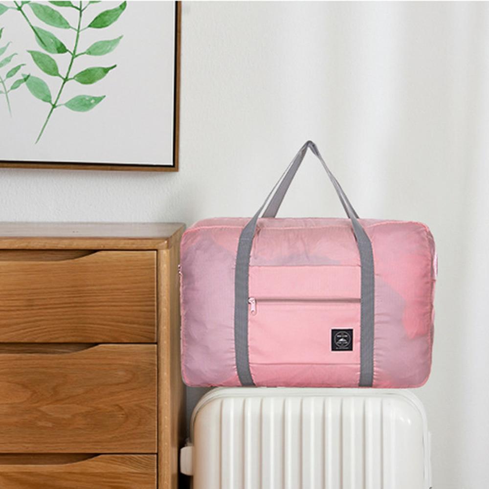 Gnwxy 2020 nova náilon dobrável saco de viagem grande capacidade moda fim de semana bolsa para homens mulheres carry on sacos de bagagem dropshipping