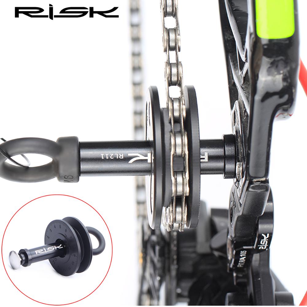RISK-certidor de cadena de bicicleta multifunción, herramienta de limpieza con esponja para engrasador de cadena, soporte para rueda de bicicleta, Protector de palanca de liberación rápida