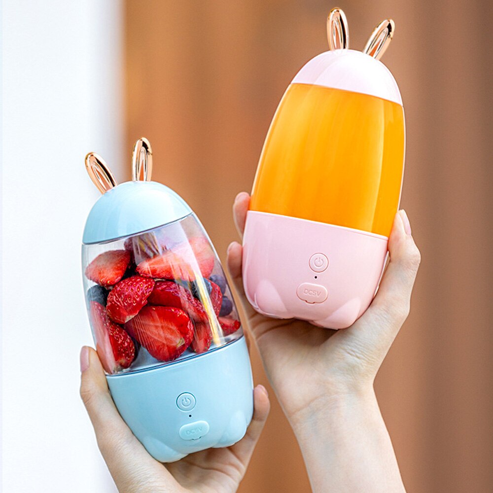 Mini kannettava sähköinen mehulinko suurella kapasiteetilla akulla kotitalouksien kevyt käytännöllinen mehupuristin kuppi ulos menevä mehulinko