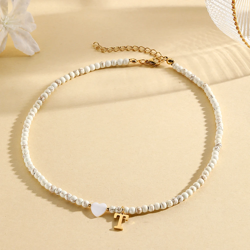 Gargantilla bohemia con cuello, collares con iniciales, cuentas colgantes con letras de concha en forma de corazón, collar de acero inoxidable para mujer, tendencia 2024: Chapado en zinc azul