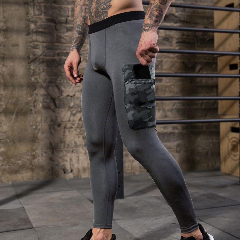 Gym Männer Fitness Beiläufige Laufende Sport Hosen Stretch Atmungsaktiv Schnell Trocknend Strumpfhosen Strahl Fuß Hosen mit Tasche