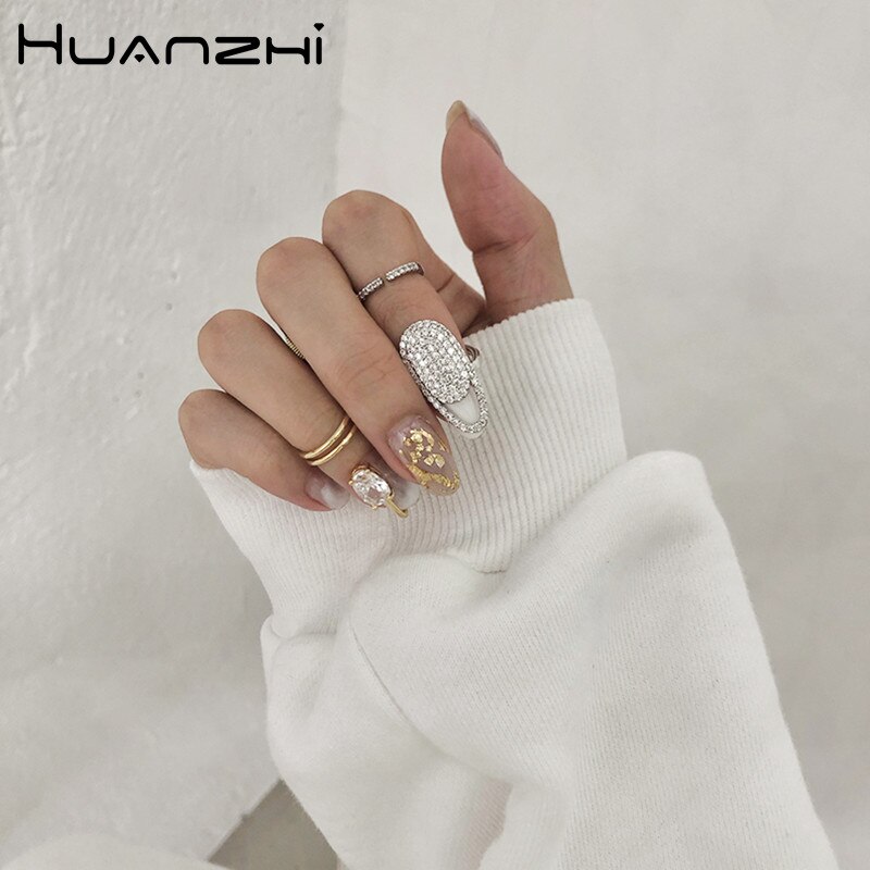 HUANZHI Neue Koreanische modisch Coole glänzend Strass Intarsien Fingerspitze Nagel Legierung ringe für Frauen Mädchen Party Zubehör