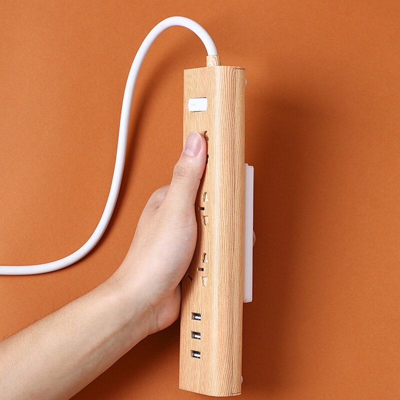 Punchfree-Soporte adhesivo para enchufe, fijador de pared, tira de alimentación, enchufes de almacenamiento, estante, gancho extraíble