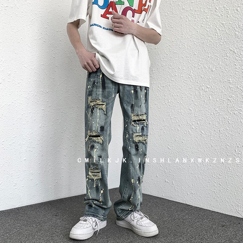 Blu strappato jeans uomo sottile moda casuale gonfio jeans dritti uomo Streetwear anca salto buco denim pantaloni uomo pantaloni M-2XL