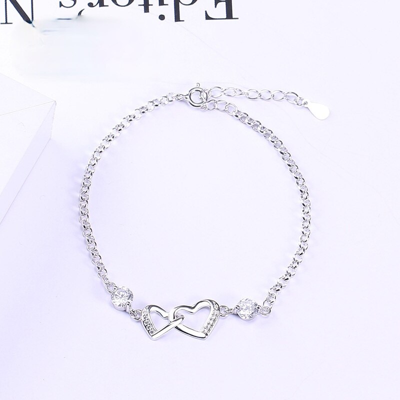 Doppio bracciale a forma di cuore con temperamento femminile del braccialetto in argento puro s925 che vende gioielli a contratto