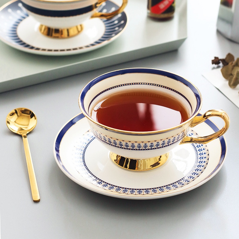 Tazas y platillos de porcelana blanca, juego de té Simple de cerámica, Tazas de café de moderno Para cafetería