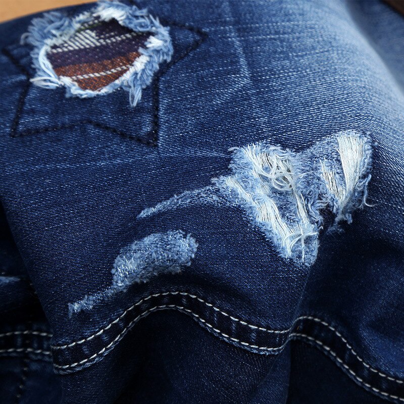 Pantaloncini di Jeans da uomo pantaloni corti al ginocchio estivi con foro rotto Jeans corti strappati da uomo blu JB13158