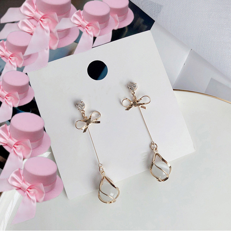Trendy oorbellen met metalen frame en hangende opalen voor dames, gouden strass-steentjes, strikjes, lange sieraden voor bruiloften en feestjes.