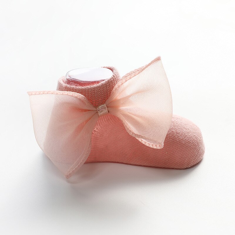 Antislip sokken voor baby's met strik, voor peuters, pasgeborenen, antislip sokken voor meisjes en jongens, effen kleur: Rood / Xs 0-6 maanden