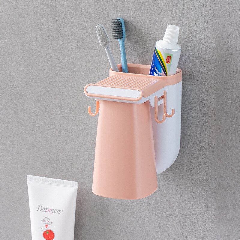 Soporte de cepillo de dientes de plástico para el hogar, colgador sólido para productos de baño, perforación, pasta dental, compresión,: Rosa