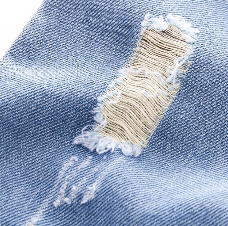 Los niños dibujo animado de Donald Duck pantalones niñas Jeans niños Jeans agujero de de los niños pantalones de mezclilla Jean para el bebé ropa infantil