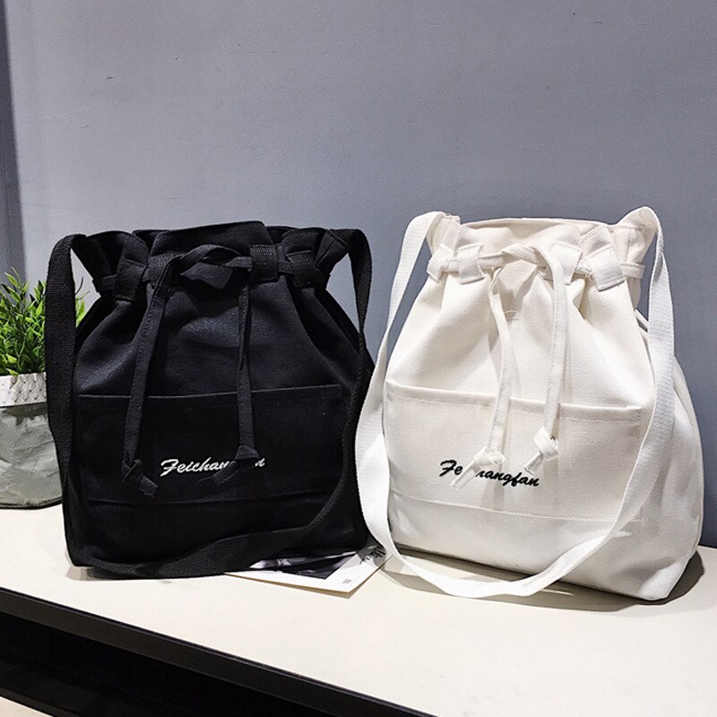 Nian lente en zomer koreaanse versie van de eenvoudige emmer canvas tas schouder laptop bulk tas messenger vrouw