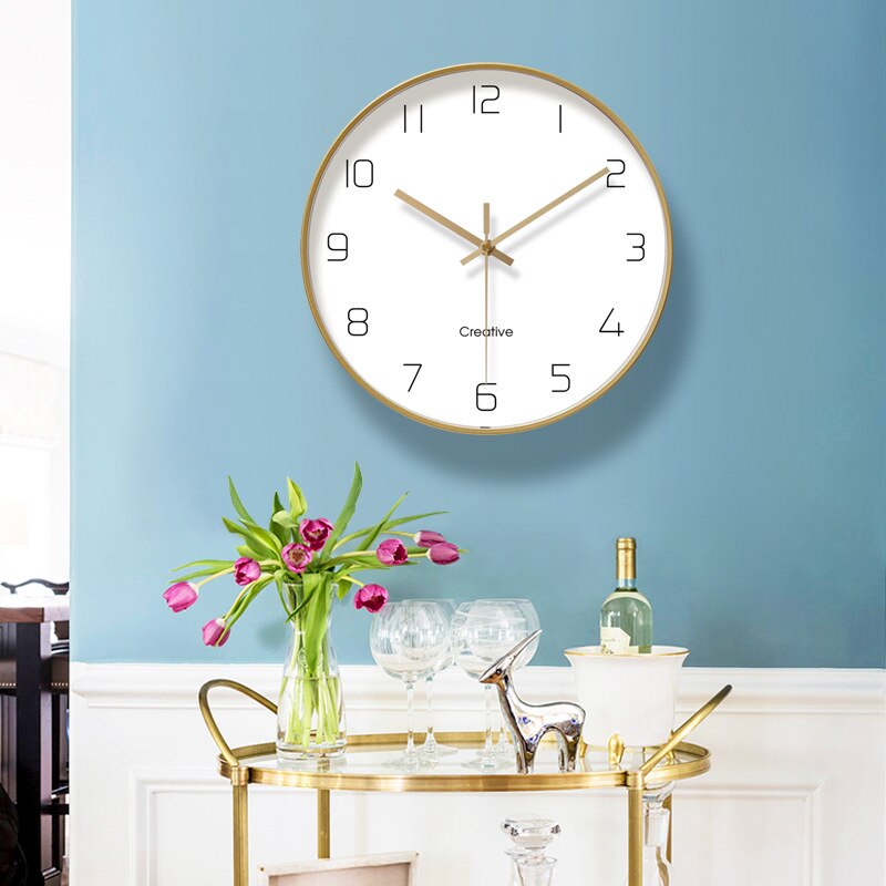 Reloj de pared de de oro de arte Simple reloj silencioso de estudio casero moderno reloj de cuarzo decorativo de