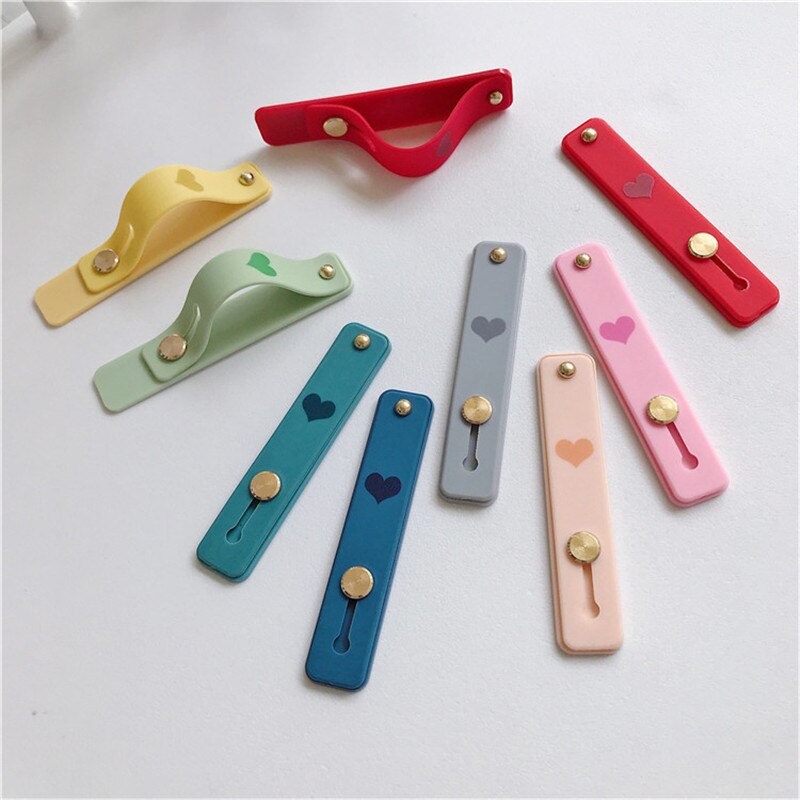 1 pz Candy color cuore custodia per cellulare staffa supporto per cinturino da polso push stretch cinturino da polso in silicone supporto per impugnatura per dito
