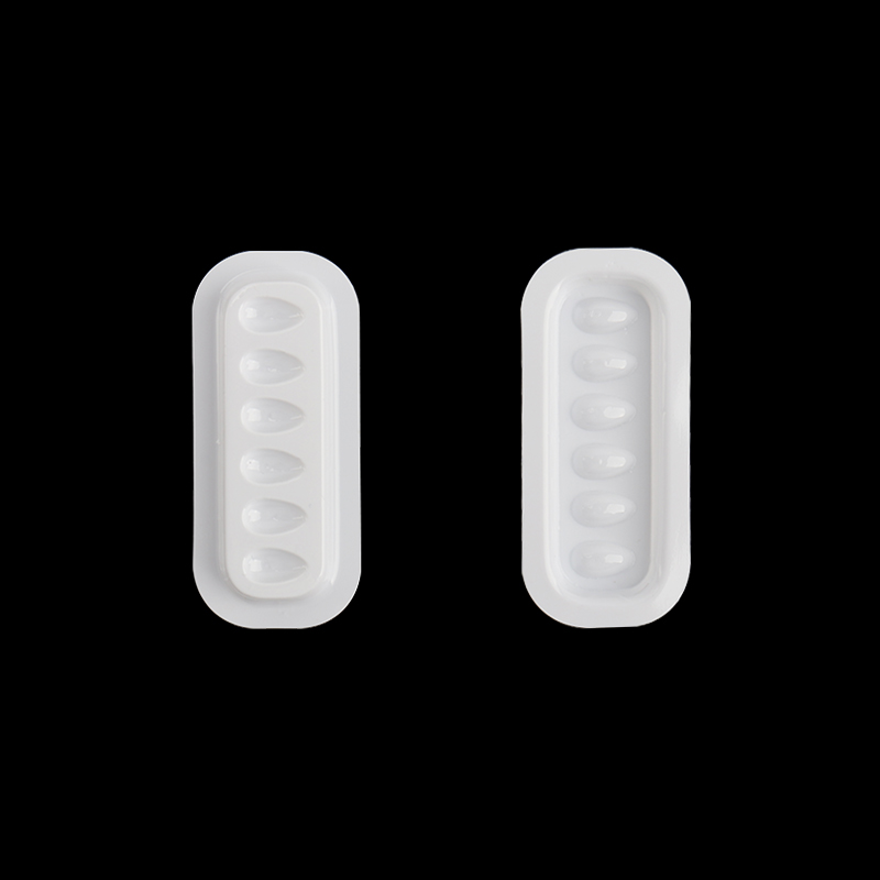 100 pièces porte-colle à cils Palette Extension de cils support adhésif tampons bande en forme de joint en plastique Palette cils artiste accessoires: Bleu