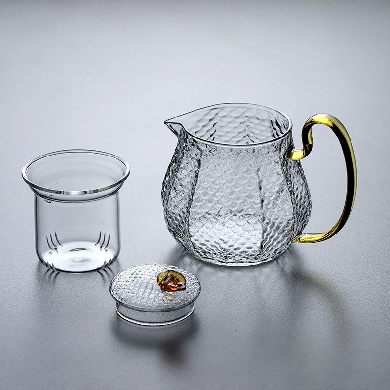 Moderne personlighed husstand simpel te maker høj temperatur resistent te sæt filter glas hammer mønster teapotzm 107