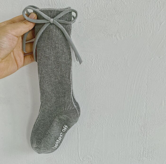 Chaussettes côtelées pour enfants bas de confort en coton Simple antidérapant pour fille avec nœud pour la décoration des robes de printemps d'automne