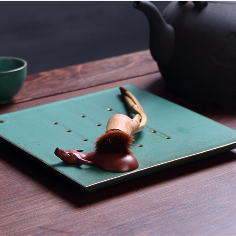 Une pièce yixing zisha thé pour animaux de compagnie violet argile thé jouer buffle chinois ornement maison table jardin décoration en ventes petite taille