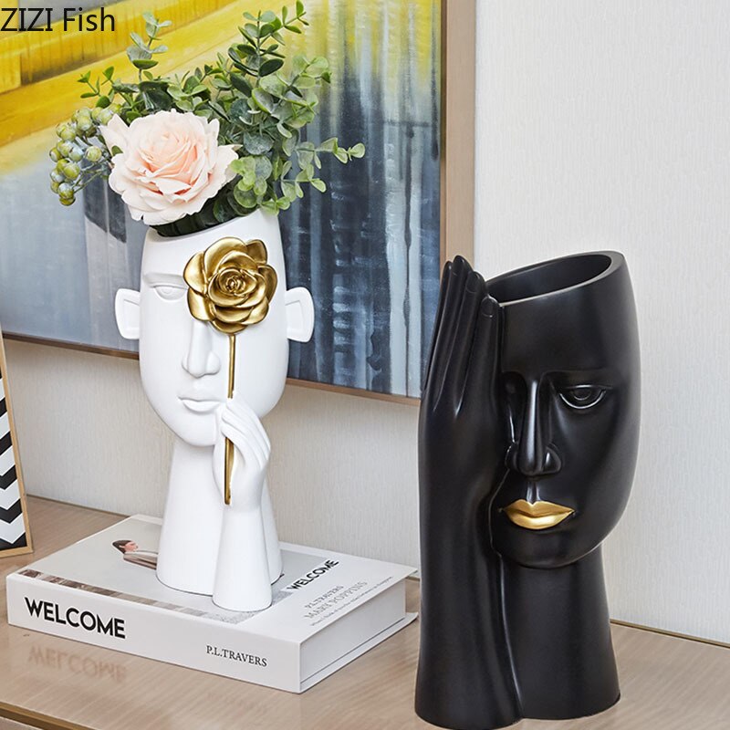 Minimalistisk portræt vaser harpiks skulptur sort menneskehoved vase blomsterpotte kontor skrivebord indretning blomster arrangement boligindretning