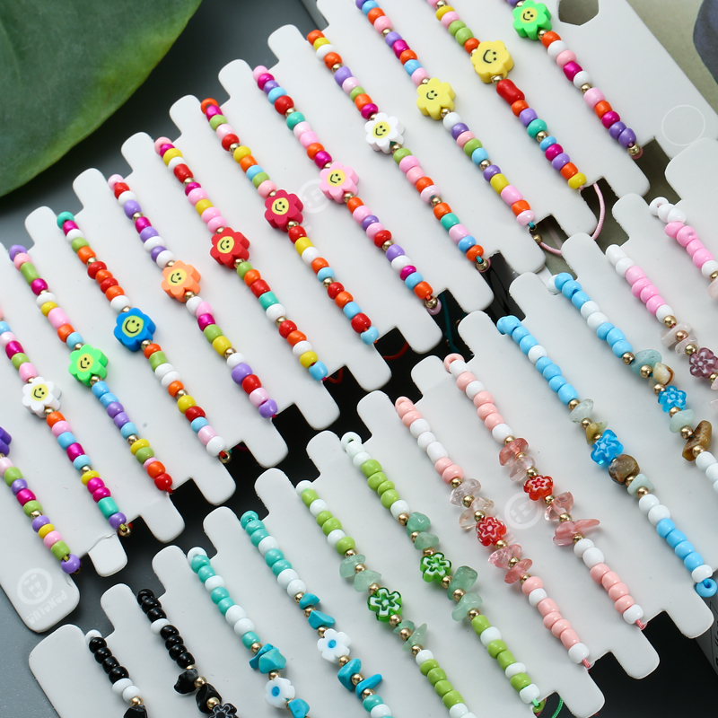 Conjunto de pulsera trenzada con cuentas para mujer y niño, brazalete de cuerda ajustable con abalorios de flores de concha de colores, 12 Uds./lote