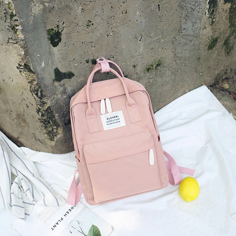 Mochila impermeable de lona para mujer, morral escolar para adolescentes y niñas,: Pink
