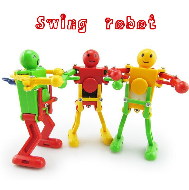 verkoop Clockwork Spring Wind Up Speelgoed Dansende Robot Speelgoed voor Kinderen Kinderen Speelgoed swing robot WYQ