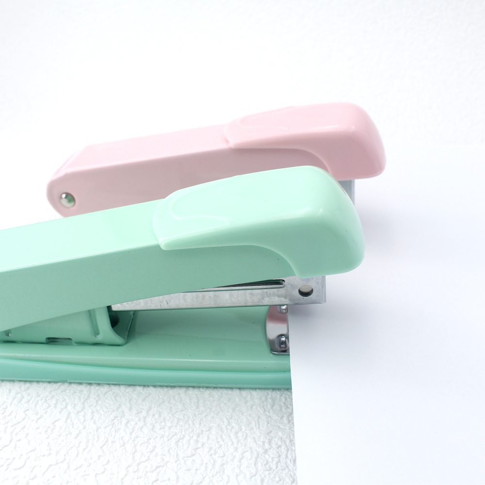 Stapler, staple remover, and staple set - a handy and stylish desktop stapler, perfect for home office use.