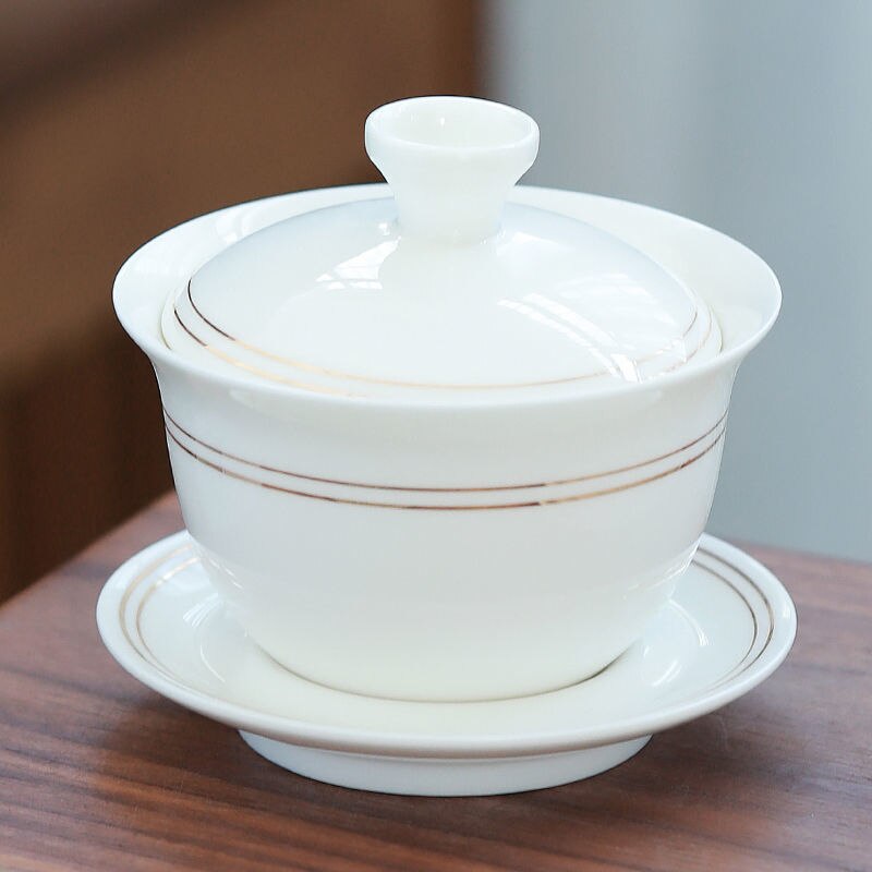 Tueen-cuenco de té de Jade, Taza de cerámica grande con contorno de porcelana blanca en dorado, para infusiones, Kung Fu