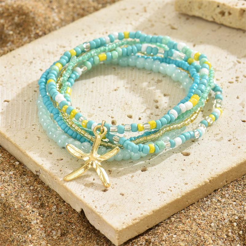 Tobillera bohemia multicapa con cuentas de arroz para mujer, tobilleras con colgante de estrella de mar a la , cadena de tobillo de playa de arena para verano, joyería en la pierna