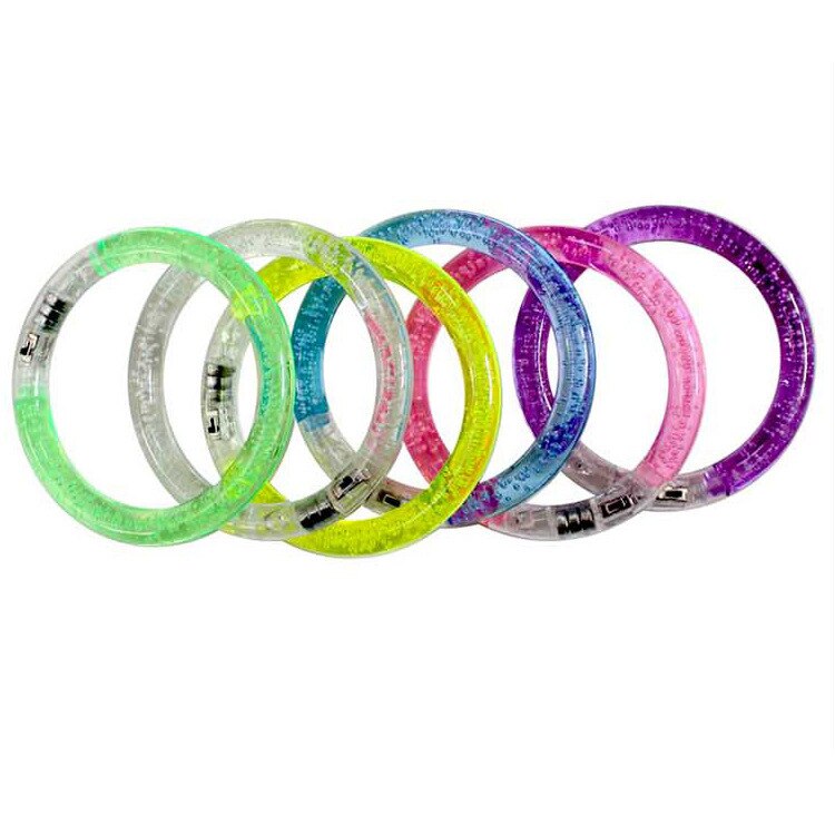 A Goods Spread Out On The Ground For Second Gram Luminescence Bracelet LED Luminescence Children Small Toys