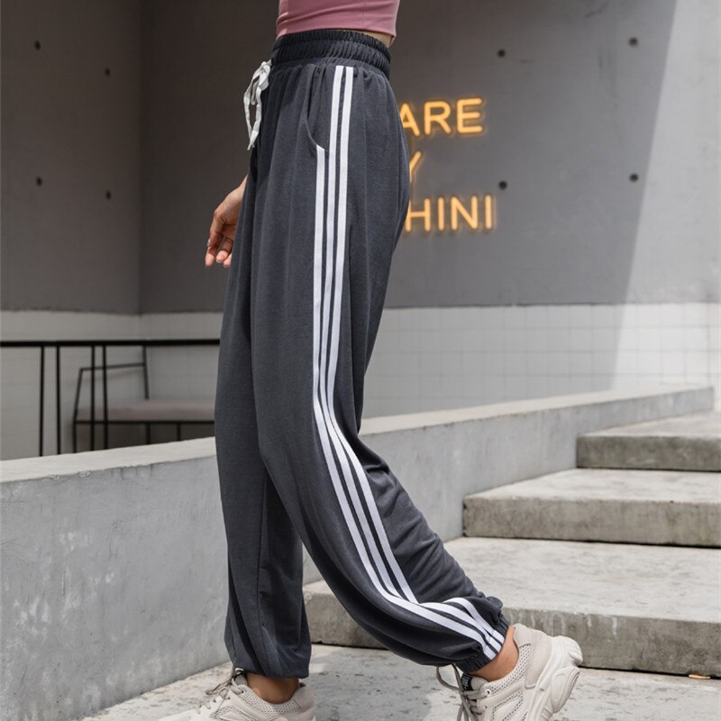 Striscia laterale Pantaloni per lo sport modale Delle Donne Allentato Respiro per Il tempo libero Sottile Di forma Fisica Di yoga Corsa e jogging anca salto Pantaloni Di ballo Delle Donne Pantaloni Da Ginnastica