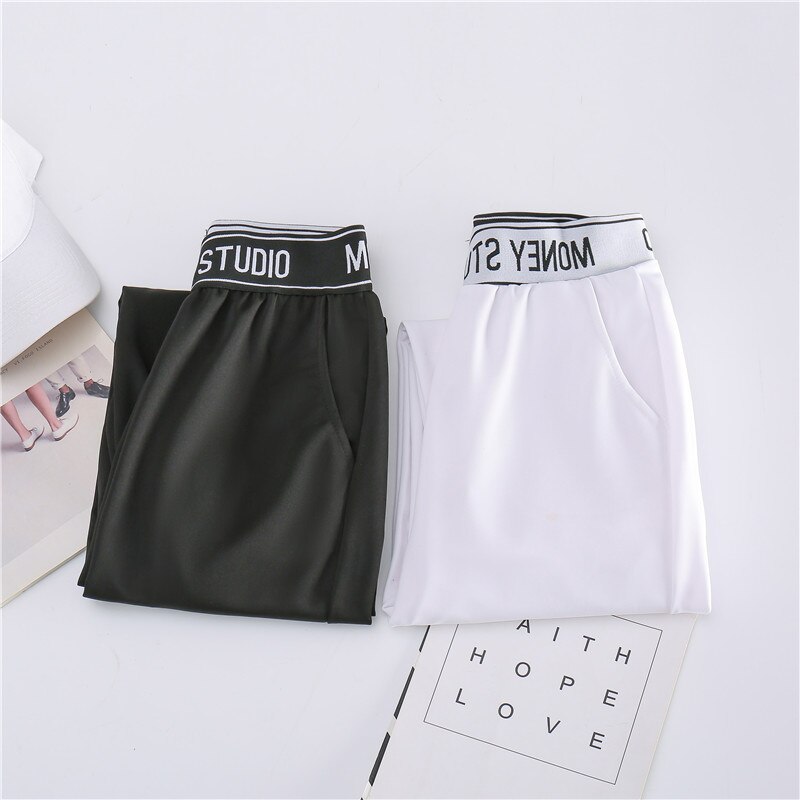 Sportbroek dames lente en herfst losse balk voeten zwarte koreaanse casual negenpuntsbroek