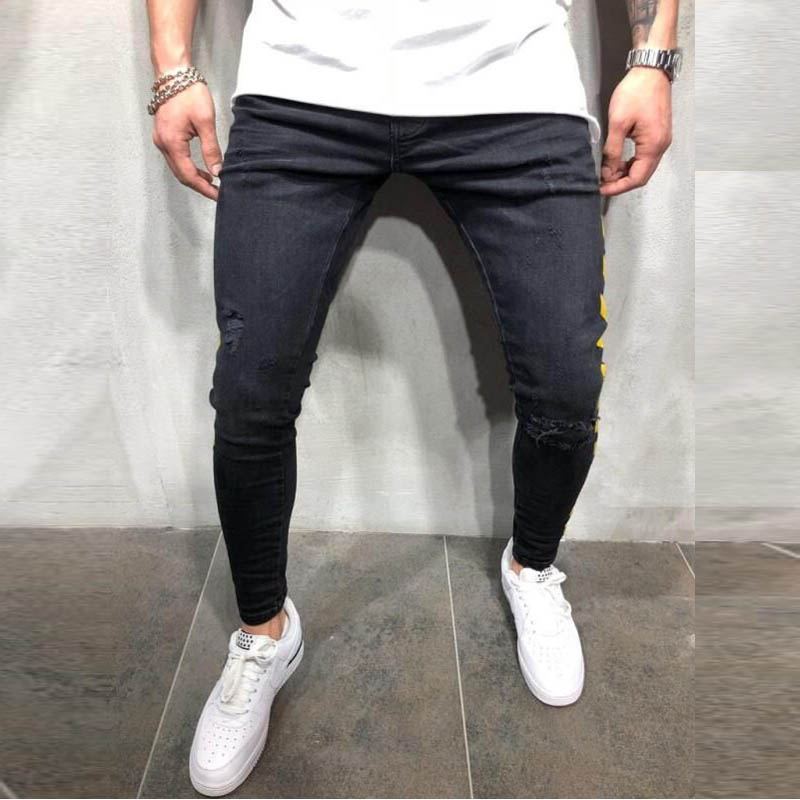 Mænds skinny sorte jeans gule sidestriber hip hop streetwear rå kant flået skinny trykt street letvægts bomuld jeans