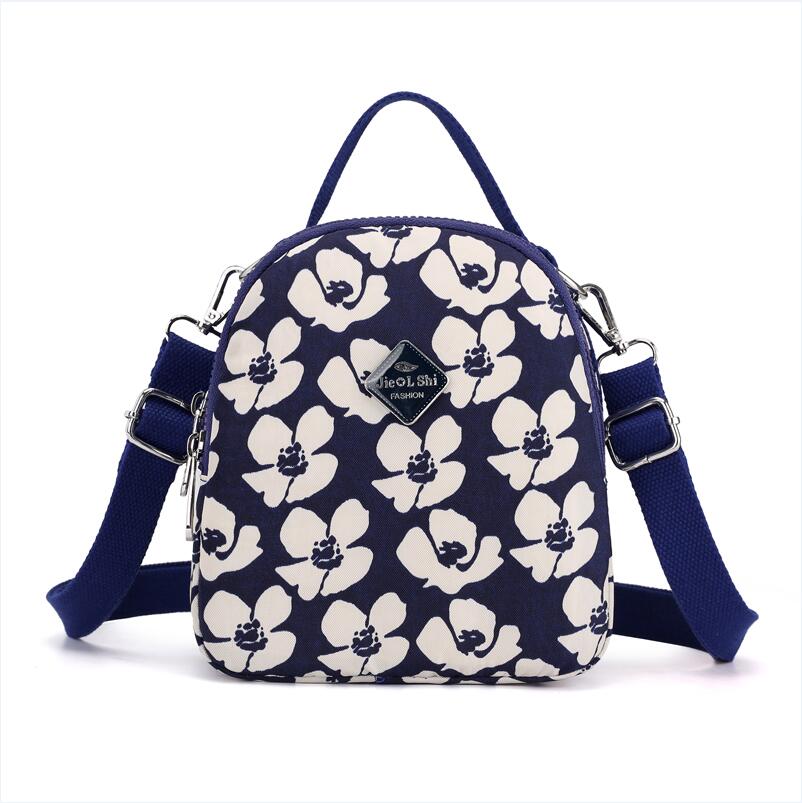 Jielshi kvinder mini rygsæk klassisk stribe mønster nylon kvindelige skulder & crossbody tasker multifunktionel tote taske til unge piger: Hvide blomster