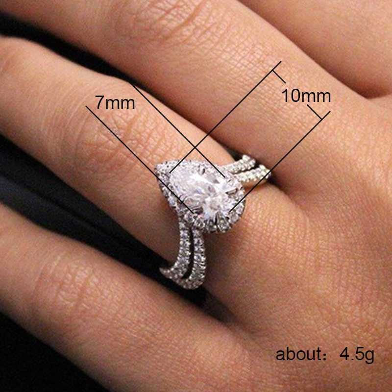 Huitan Romantic Wedding Engagement Ring with Clear Pear Shape Cubic Zirconia Prong Setting Jewelry Rings for Women