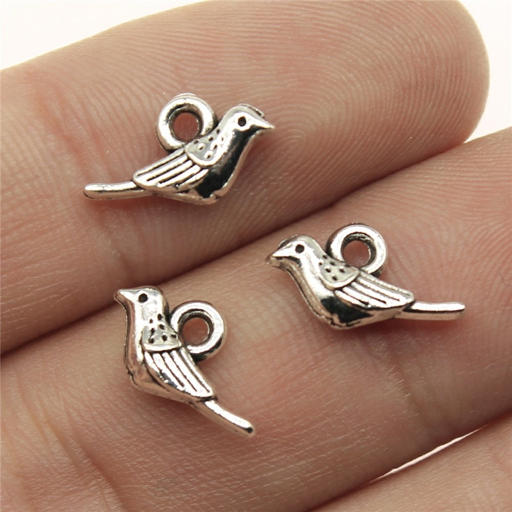 20 piezas de dijes de pájaros pequeños de 12x8mm para hacer joyas, dijes de pájaros antiguos, de Color plata, dijes de pájaros pequeños