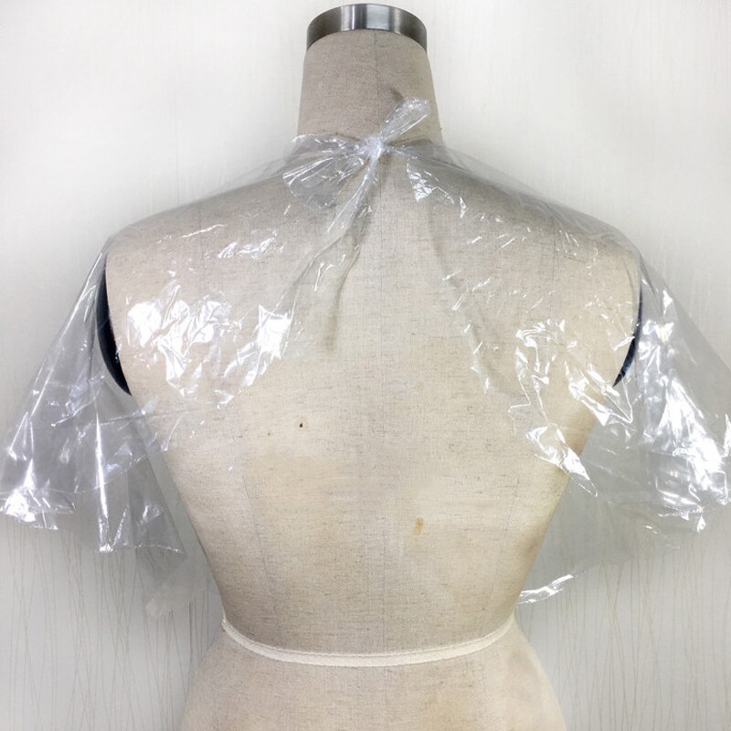 Capas desechables de peluquería, delantal de corte permanente, teñido de PE, paño impermeable, capa de peluquero, paño transparente para peluquería, 100 Uds.