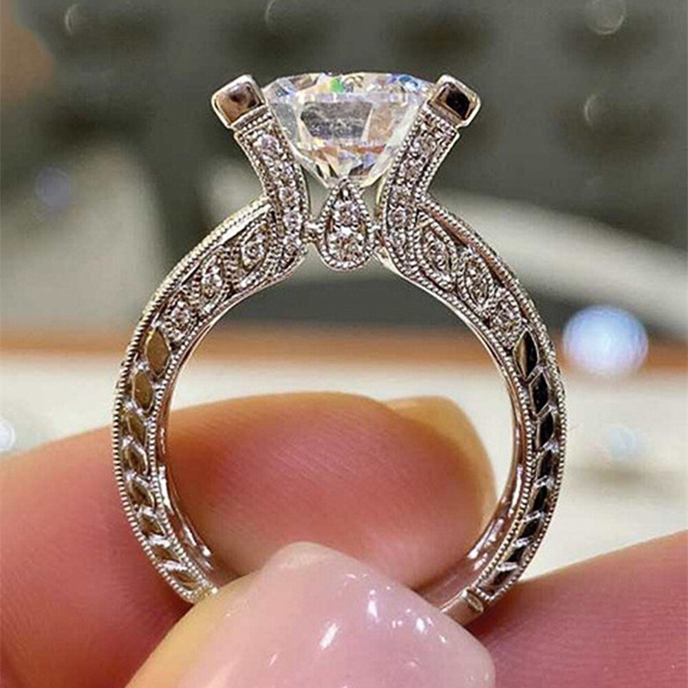 Huitan-anillo de compromiso con Circonia cúbica para mujer, sortija de compromiso con clásico, redonda, 10mm, de lujo, para boda