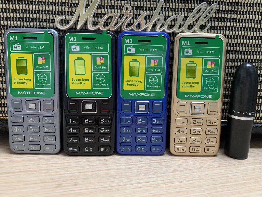 Mini-mobiel met m1 drukknoppen, 1.4 inch dual-sim, basistoetsenbord, zaklamp,  mp3 camera's, fm-radio, kleine goedkope mobiele telefoon