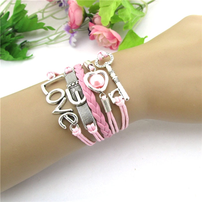 Bracelets pour femme pulseira masculina accessoires charme infini coeur perle amour clé cuir alliage bracelet à breloques rose