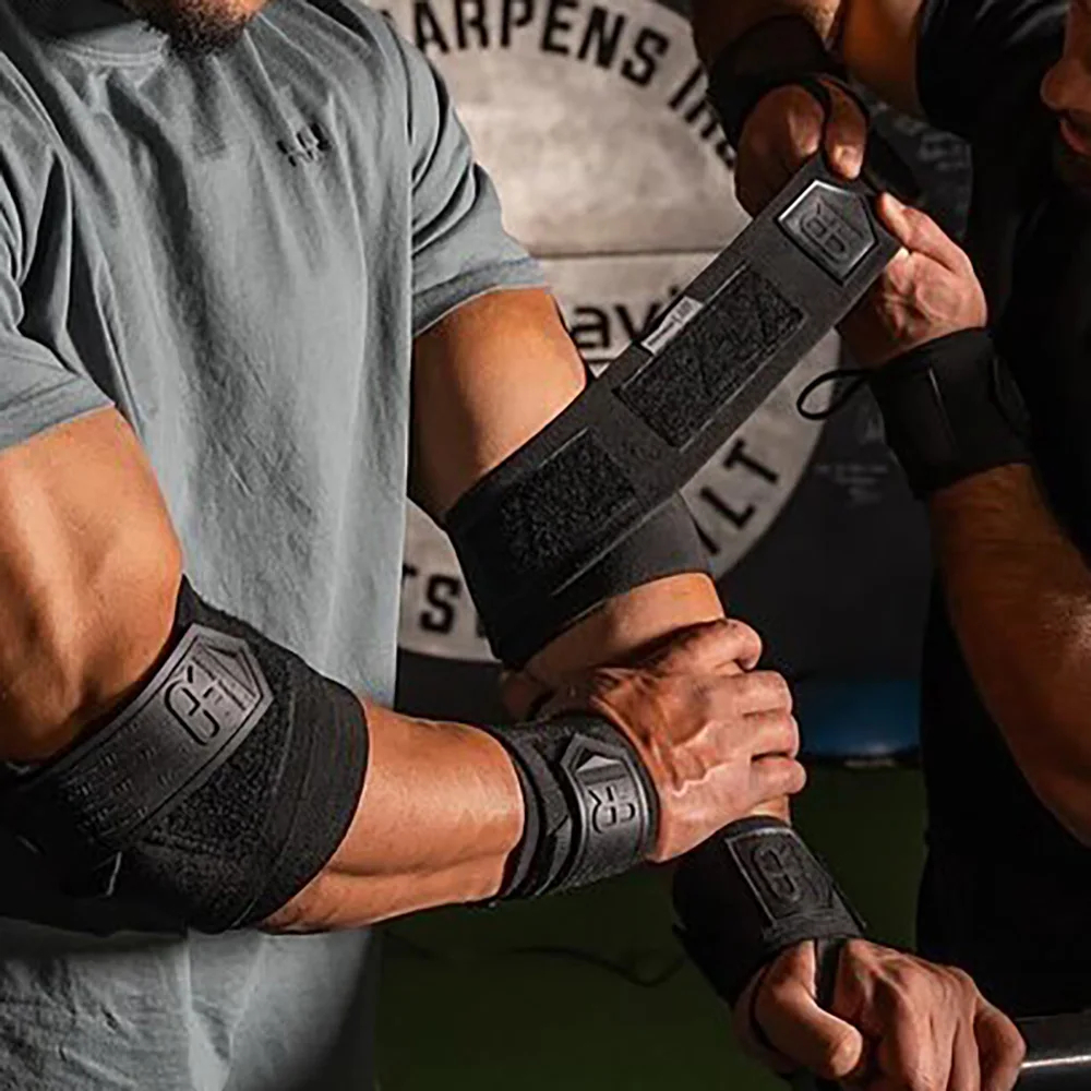 Soporte de codo para Fitness, coderas resistentes totalmente negras, vendaje ajustable, banco de levantamiento de pesas, prensa CrossFit, envoltura de entrenamiento, correa