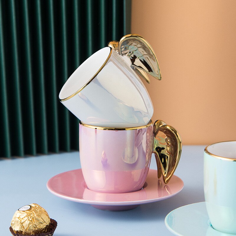 Nordycki kreatywny złoty anioł skrzydło kubek z talerzykiem porcelanowa filiżanka robić herbaty kawy zestaw uroczy prezent urodzinowy biała perła różowy niebieski kubek spodek