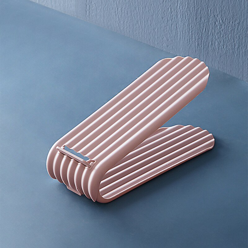 1pcs Adjustable Shoe Organizer Footwear Support Slot Space Saving Cabinet Closet Stand Shoes Storage Rack Shoebox shoe organizer: pink