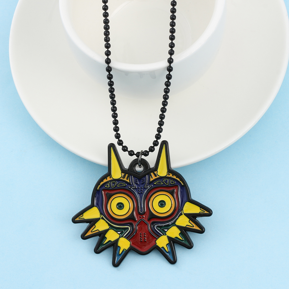 La légende du collier bouclier hylian oeil de Sheikah masque de Majora épée triforce symbole pendentif Zelda larmes du royaume