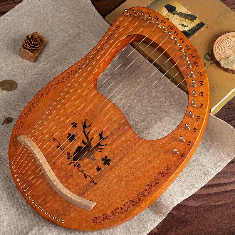 19 leierharfe aus mahagoniholz, musikinstrument mit stimmschlüssel und ersatzsaiten